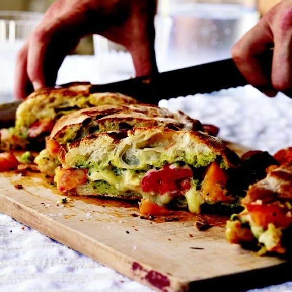 Curtis Stone's outdoor grilled cheese sandwiches with tomatoes and pesto recipe Photo by Quentin Bacon