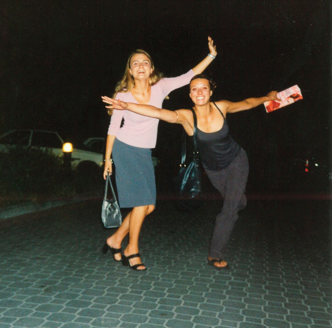 Dancing on the street with a friend when she was 21 and travelling through Europe