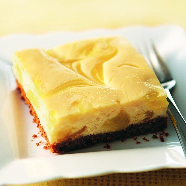 Coconut cheesecake squares with lemon swirl