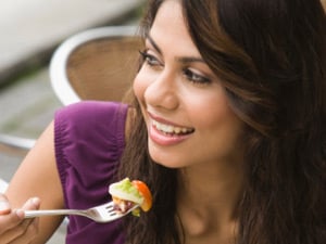 Woman eating healthy meal