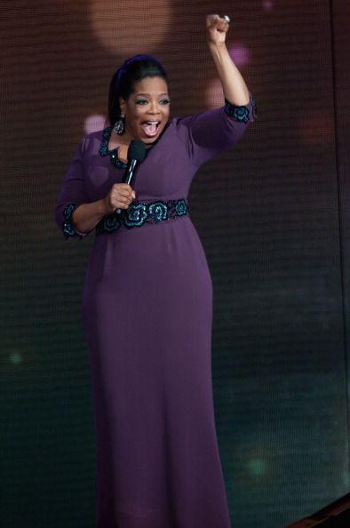 Oprah, purple dress
