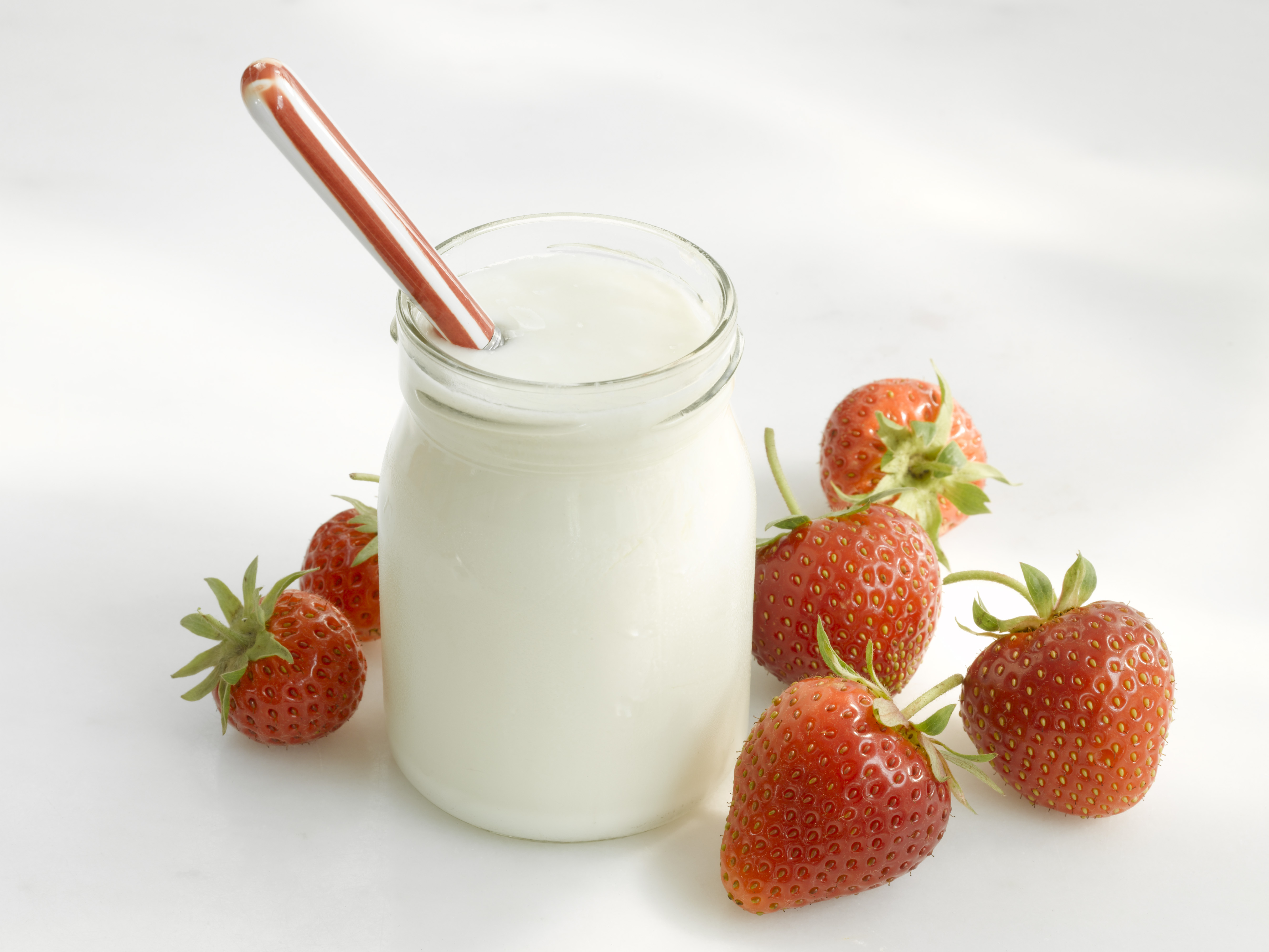 jar of yogurt and strawberries
