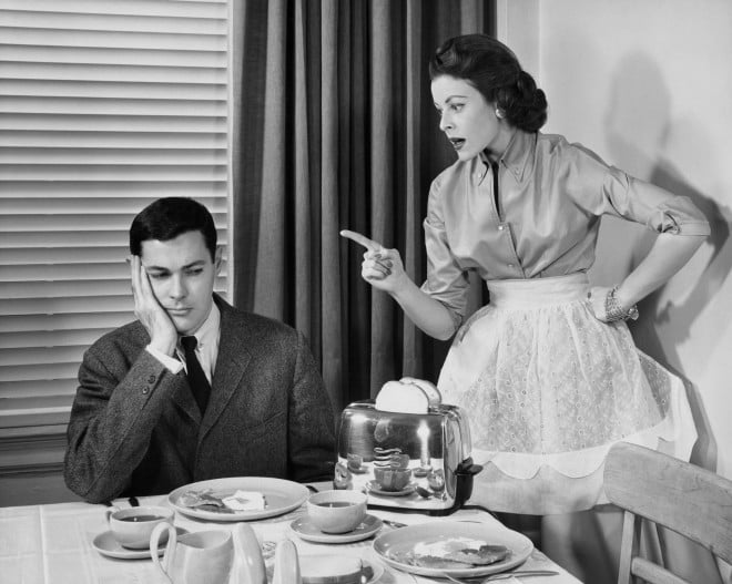 woman nagging man, black and white photo