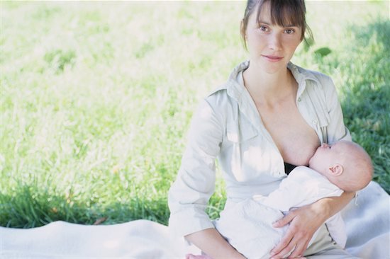 Mother breastfeeding baby