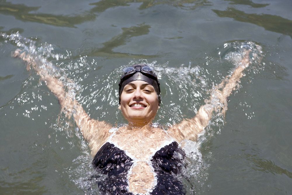 Woman swimming in the lake