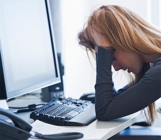 Woman tired, sleeping at desk