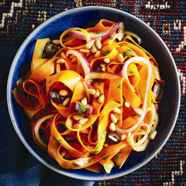 Carrot curls with pine nuts