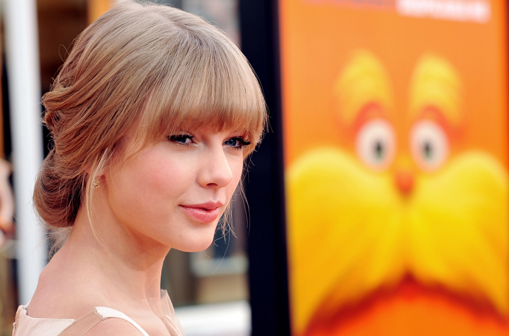 Singer Taylor Swift arrives at the premiere of Universal Pictures and Illumination Entertainment's 3D-CG "Dr. Seuss' The Lorax"