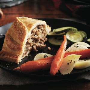 Tourtiere, pickled vegetables and buttered root vegetables