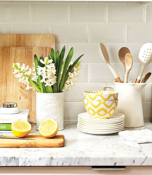 Feature-Photo-Marble-Counter-with-Cutting-Board-Ladels-Plants