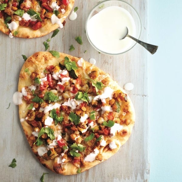Indian chickpea pizza with lime raita