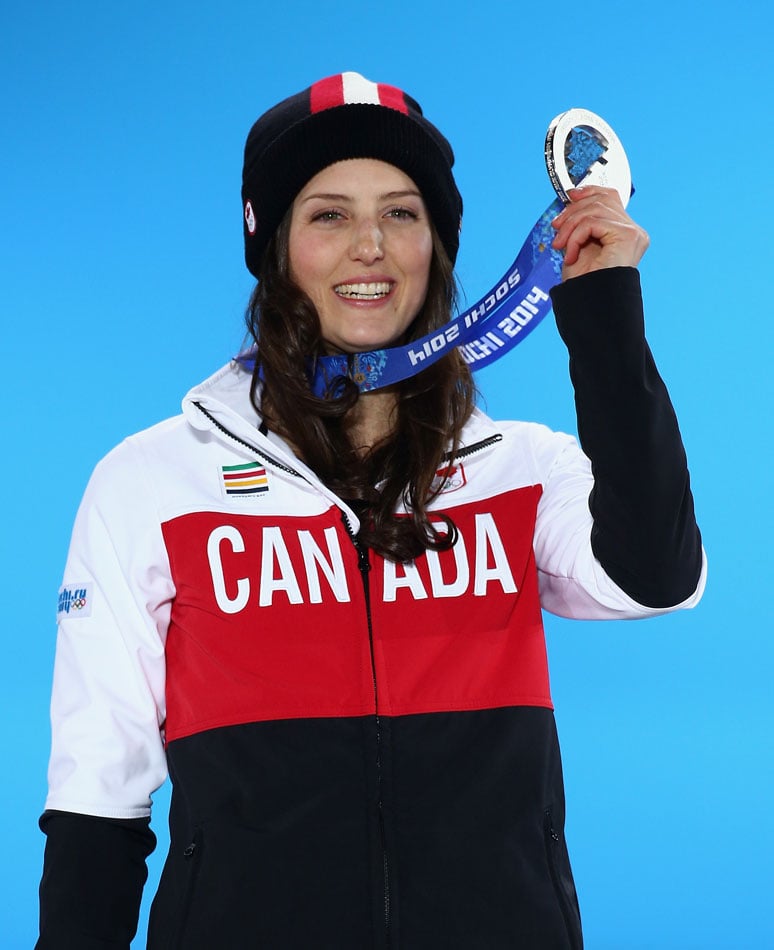 Silver medalist Kelsey Serwa of Canada celebrates during the medal ceremony for the Women's Ski Cross on day fourteen of the Sochi 2014 Winter Olympics