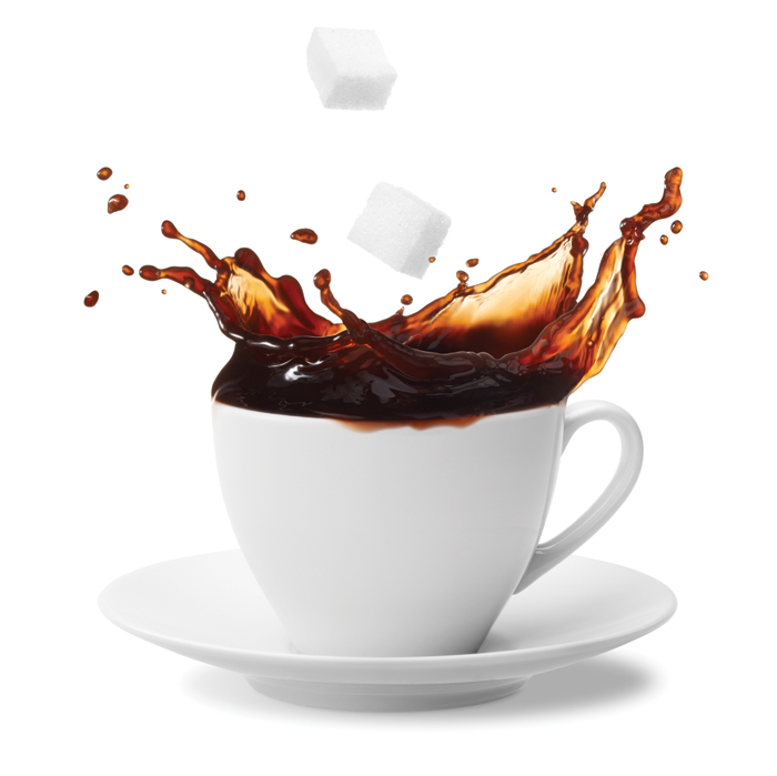 Coffee cup with sugars splashing into it