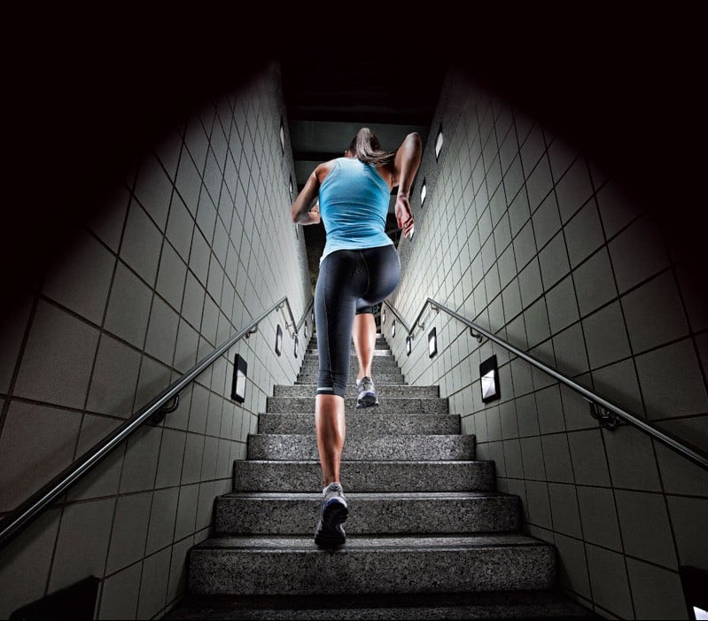 woman running up stairs, exercise
