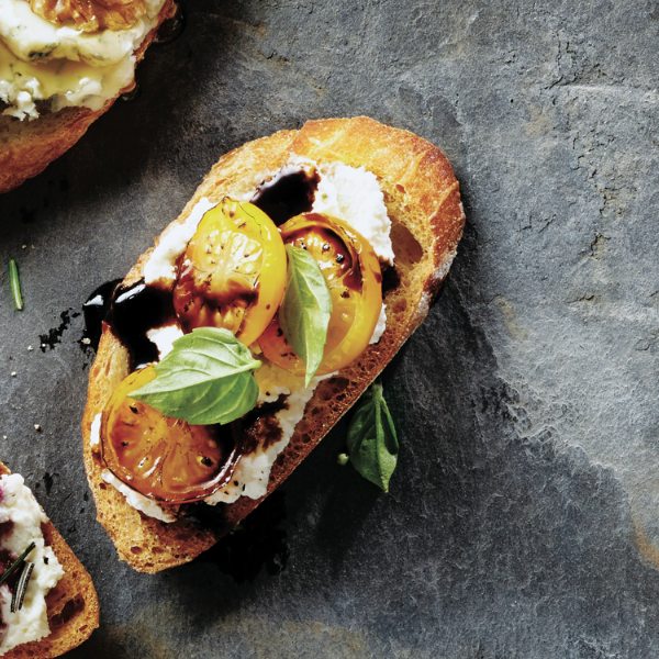 Ricotta and roasted tomatoes with balsamic crostini