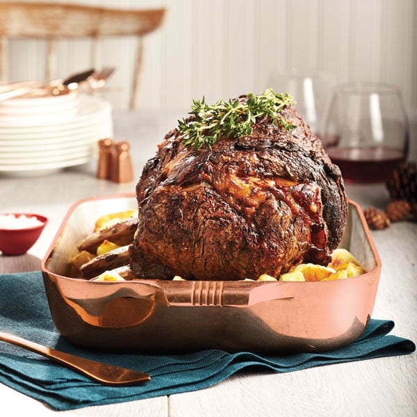 roast beef recipe with potatoes served in a copper pan
