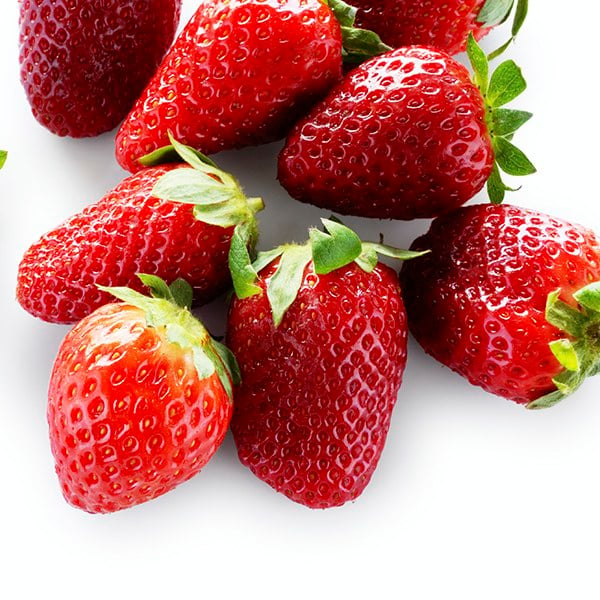 Fresh strawberries on white counter