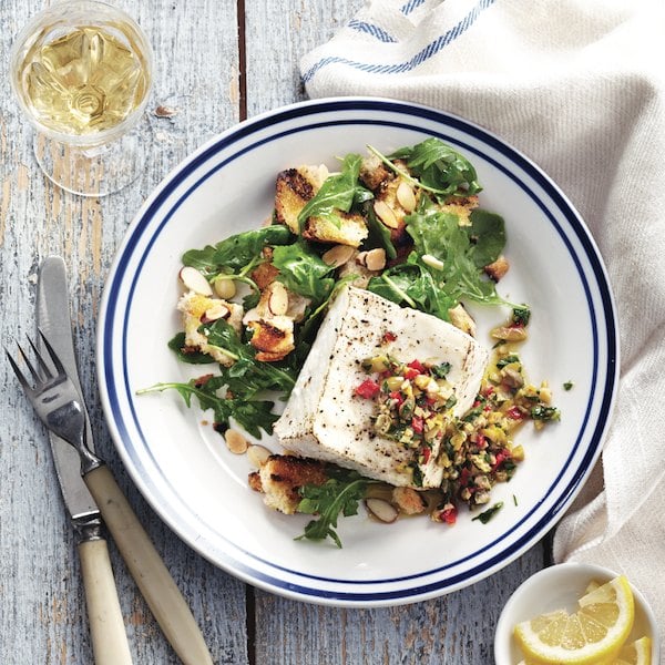 Herb and olive halibut with grilled bread salad