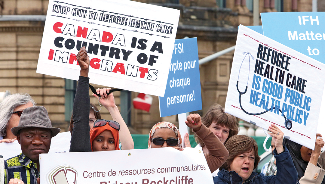 canadians protesting for refugee health care in canada