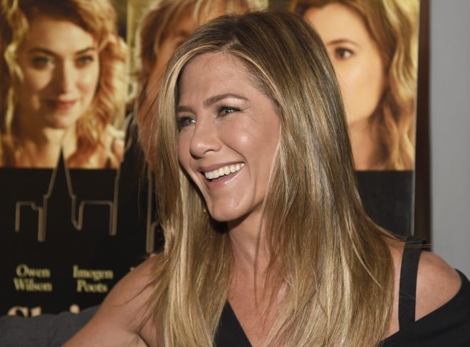 Jennifer Aniston arrives at the Los Angeles premiere of "She's Funny That Way" at the Harmony Gold theater on Wednesday, Aug. 19, 2015. (Photo by Chris Pizzello/Invision/AP)