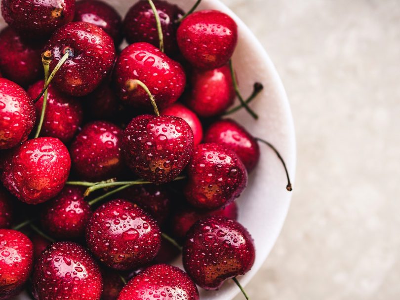 how to pit cherries - bowl of fresh cherries