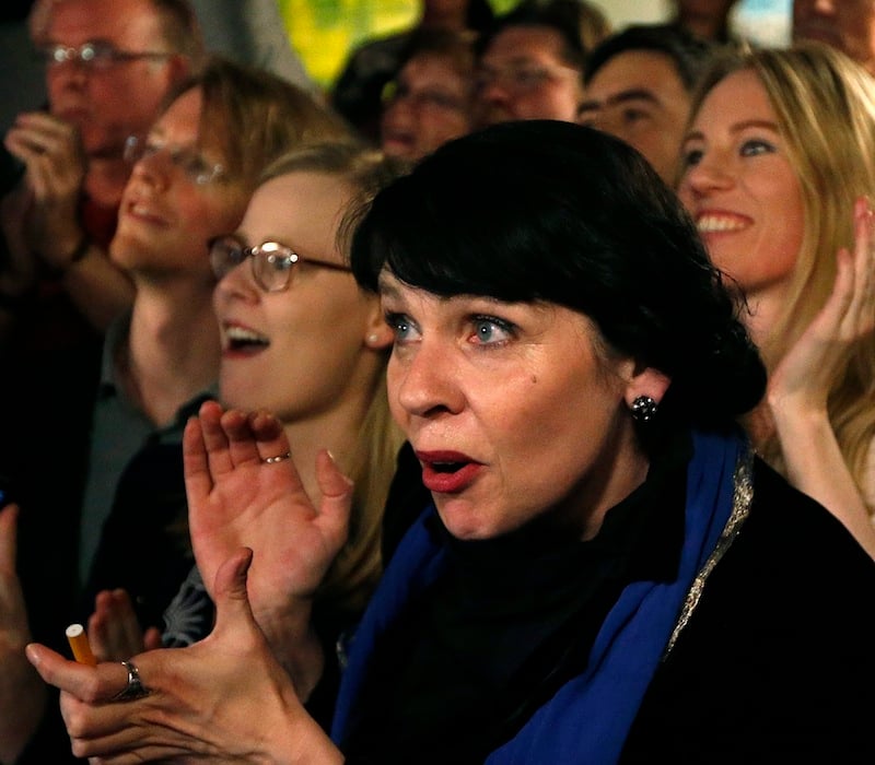 Birgitta Jonsdottir of the Pirate party (Pirater) reacts after the first results in Reykjavik, Iceland, Saturday, Oct. 29, 2016. Parliamentary elections were held in Iceland on Saturday, with more than 250,000 voters entitled to elect 63 members of the Althing parliament. (AP Photo/Frank Augstein)