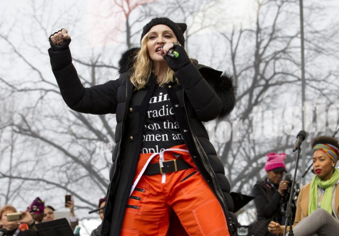 Madonna performs on stage during the Women's March rally, Saturday, Jan. 21, 2017, in Washington. Madonna, Julia Roberts, Scarlett Johansson, Cher, Alicia Keys, Katy Perry, Emma Watson, Amy Schumer, Jake Gyllenhaal and feminist leader Gloria Steinem were just some of those Hollywood A-list celebrities in attendance at the march in Washington. (AP Photo/Jose Luis Magana)