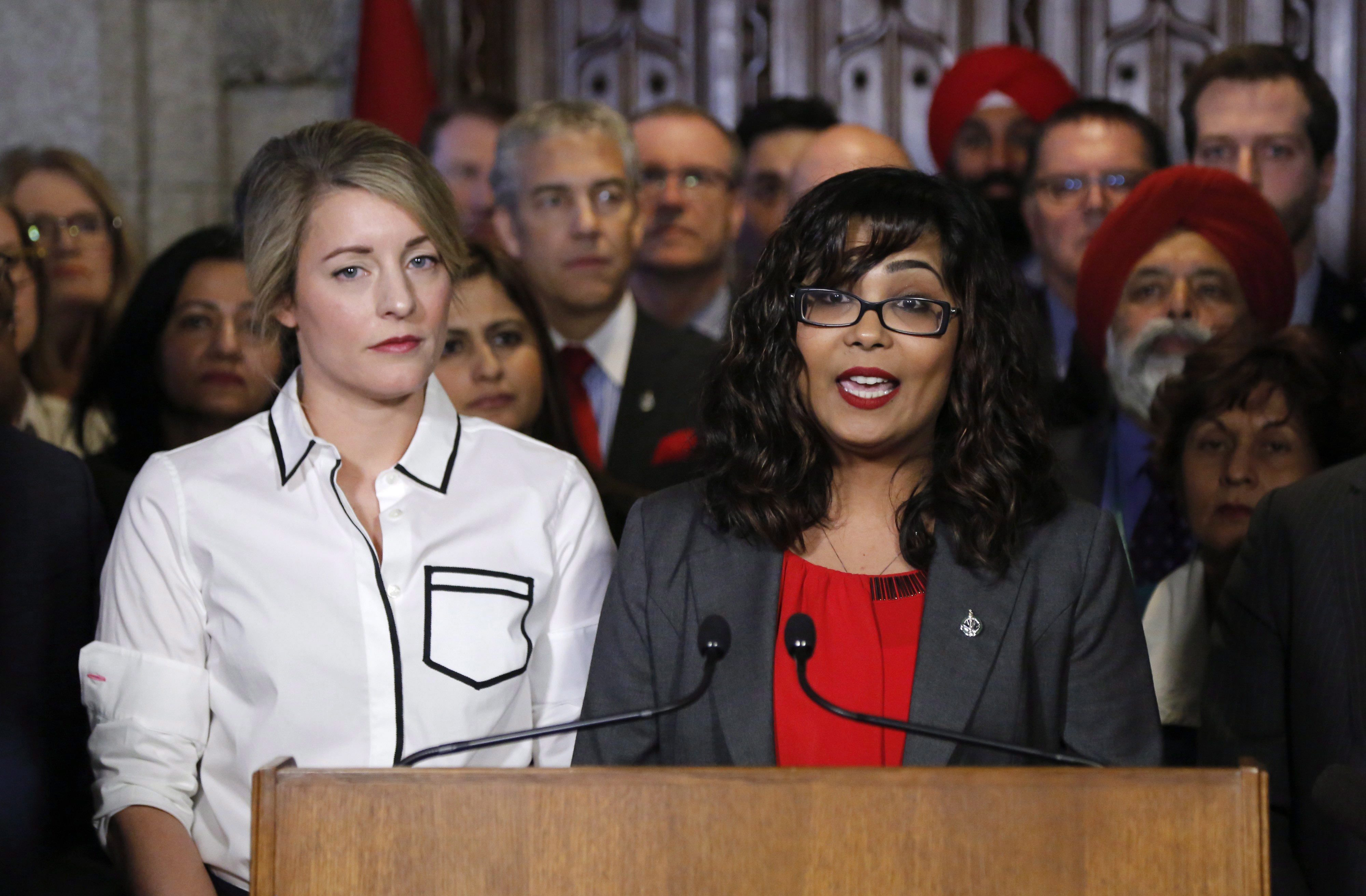 Liberal MP Iqra Khalid, right, makes an announcement about an anti-Islamophobia motion with Minister of Canadian Heritage Mélanie Joly looking on. Photo, Patrick Doyle/CP.