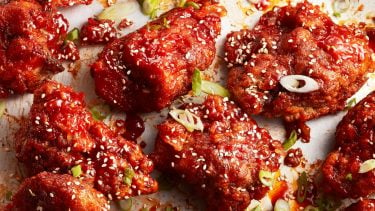 chicken wings recipe topped with green onions