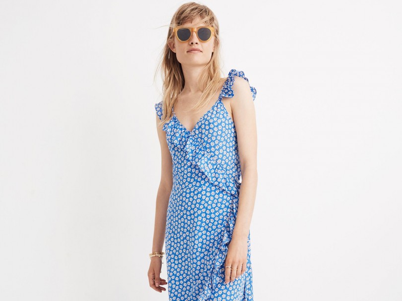Summer maxi dresses, like this blue Madewell Ruffled Wrap Maxi Dress in Mini Daisy, are an easy pick for summer