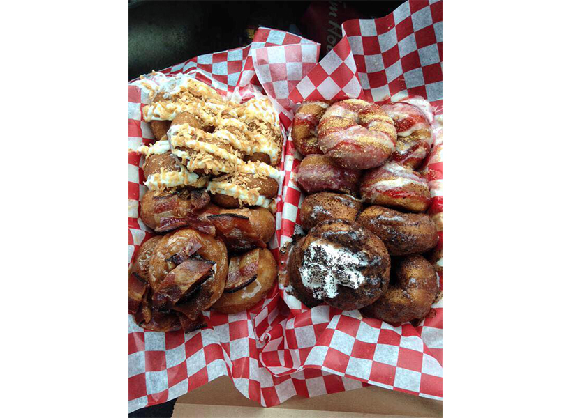Two trays of piled doughnuts from Ol' School Doughnuts in Halifax.