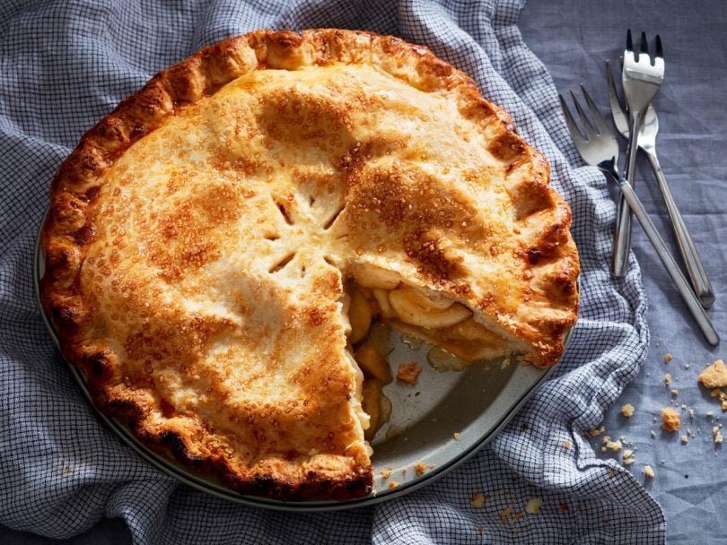 apple recipes: Apple pie with a slice cut out