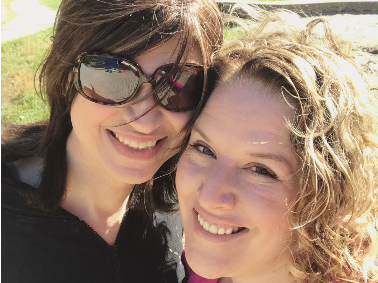 trans daughter-Zoe and Amanda pose for a selfie while on vacation.