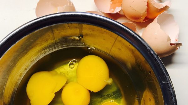cracked eggs in a bowl. Photo, Oliver Zenglein