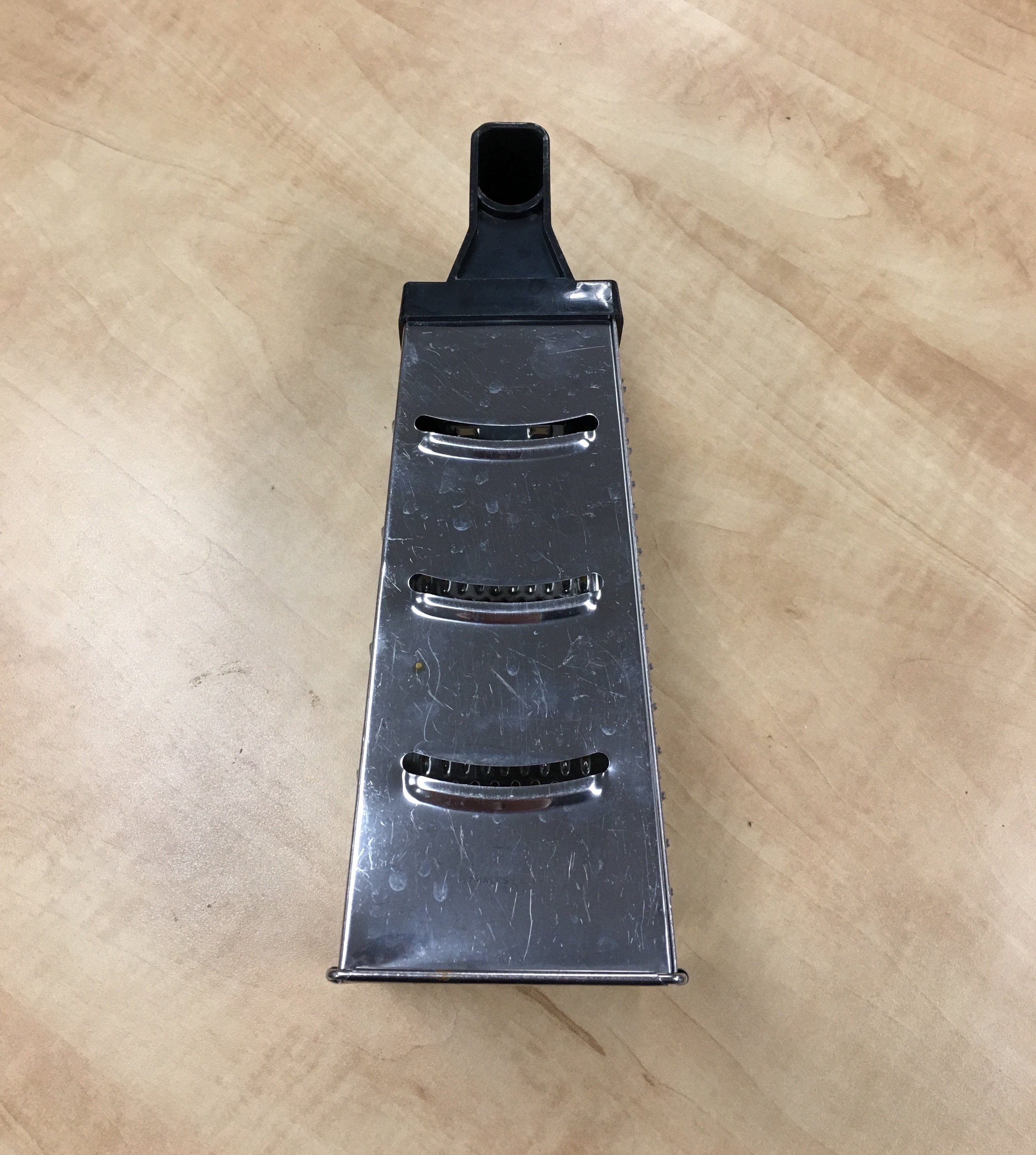 Use this side of a box grater for slicing.