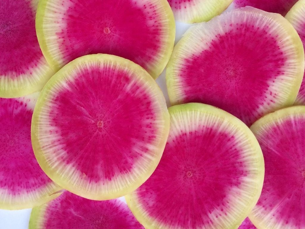 watermelon radishes cut into thin slices
