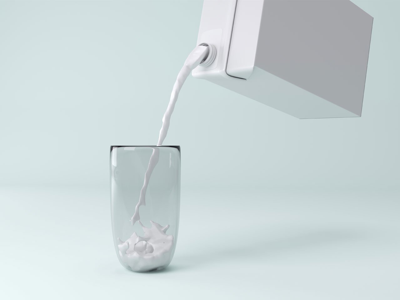 Milk Alternatives - Milk being poured into a glass