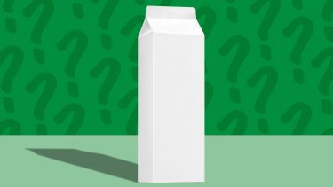 buttermilk subsitute symbolized by carton of milk on green background