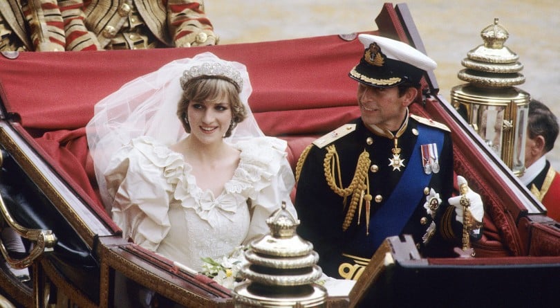 Princess Diana and Prince Charles ride in a carriage