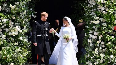 Prince Harry and Meghan Markle in Givenchy leave the royal wedding