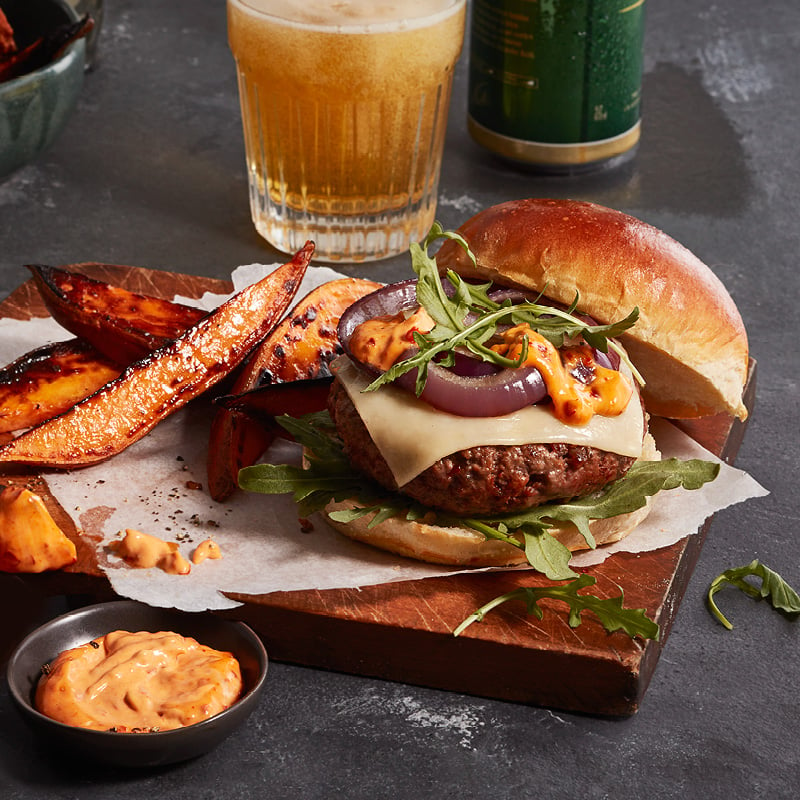 Smoky harissa burgers with grilled sweet potatoes