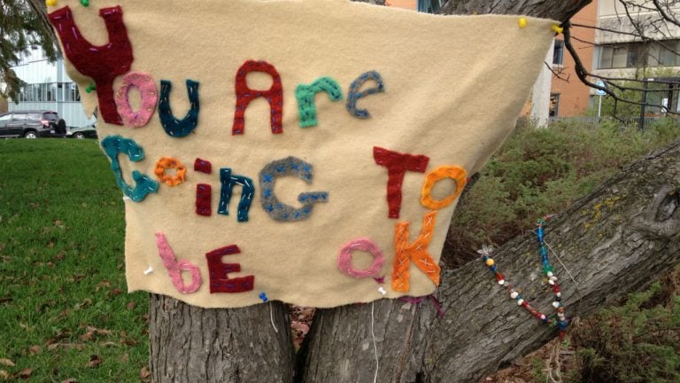 Only child died- a sign made by the writer says "You are going to be OK."