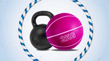 Core workout tools: weighted hula hoop, kettlebell and medicine ball