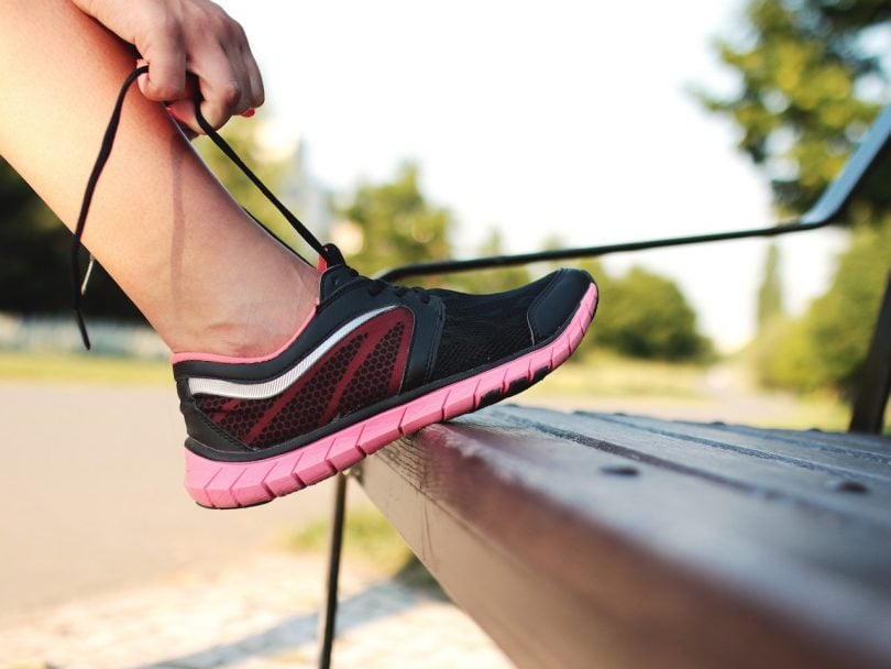 A pair of running shoes. There are benefits to starting small with micro-exercises — but going hard