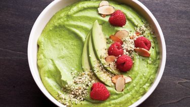 Avocado smoothie bowl with berries, avocado, almonds and hemp seeds on top recipe with avocado
