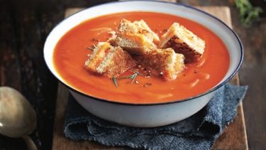 tomato soup recipe with grilled cheese croutons on top