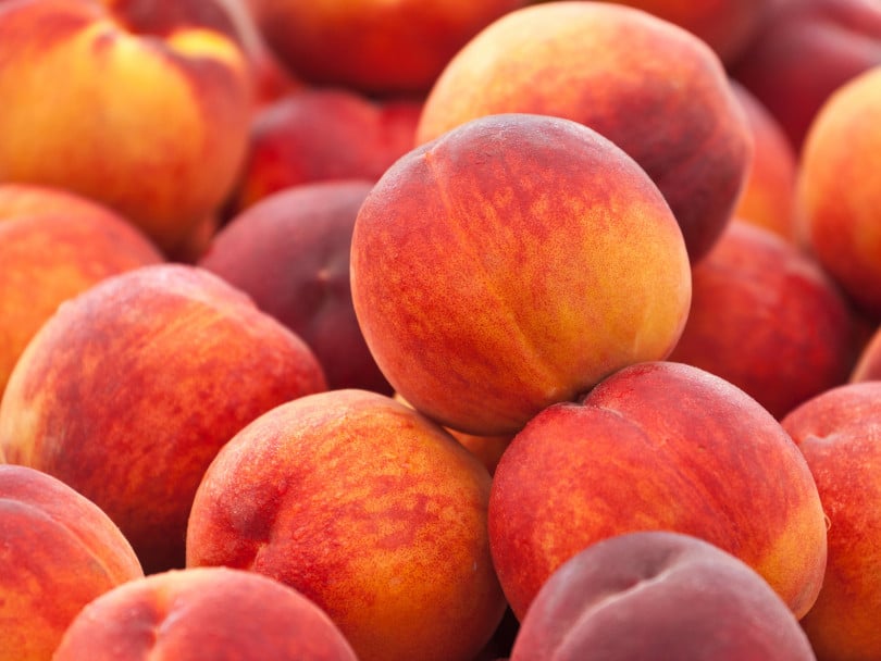 Picture of a bunch of peaches—how to peel a peach