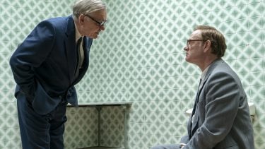HBO Chernobyl scene: Man talks down to Jared Harris as scientist Valery Legaso in room with green tiles