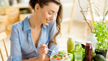 Girl eating gut health conscious foods