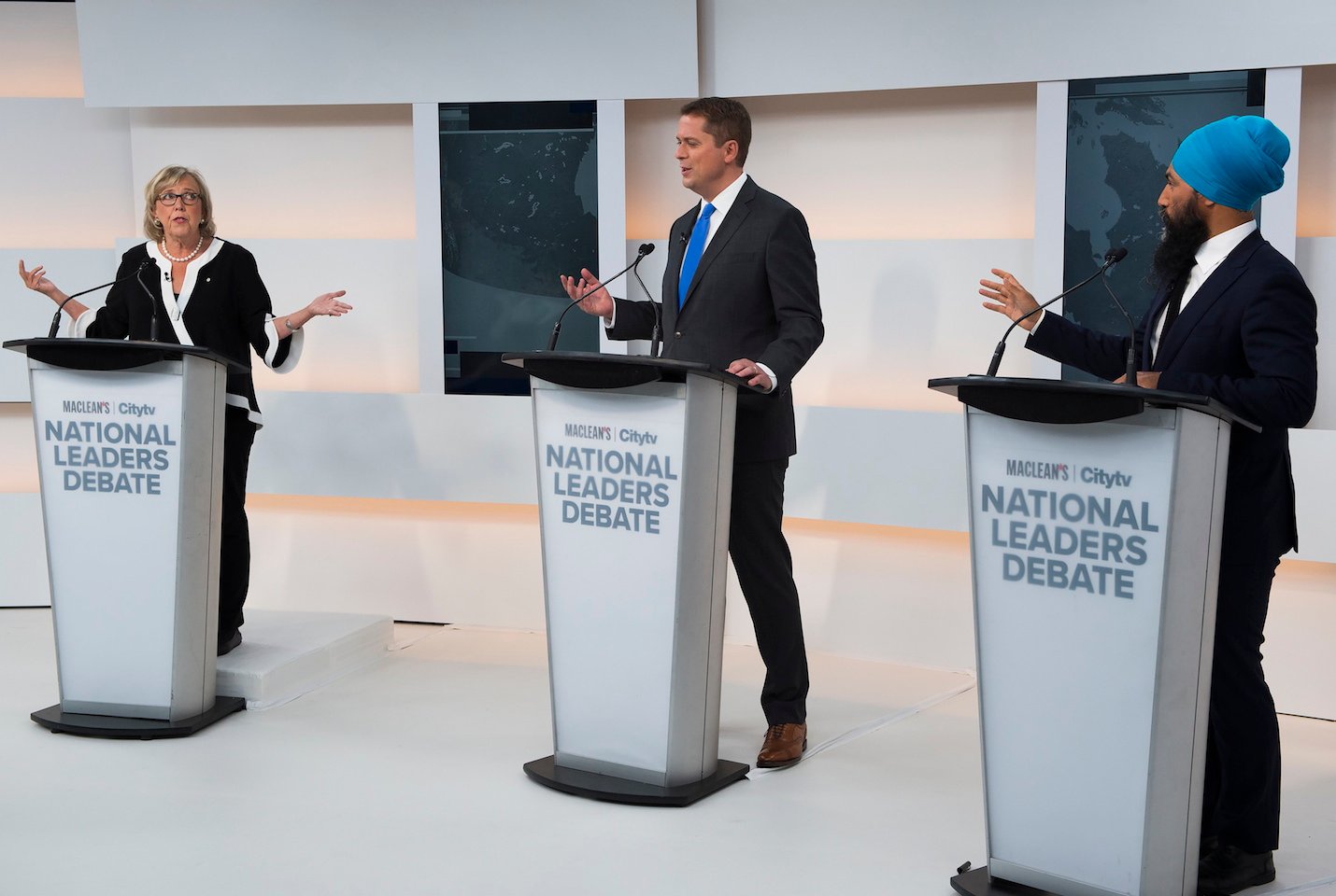 Green Party Leader Elizabeth May, left, Conservative Leader Andrew Scheer, centre, and NDP Leader Jagmeet Singh take part during the Maclean's/Citytv National Leaders Debate